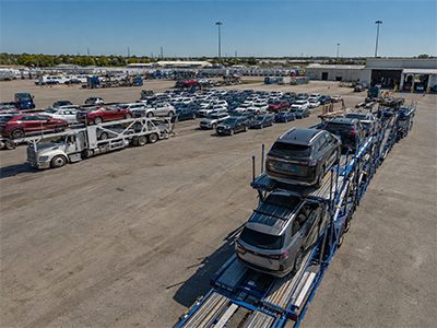 Auto transport truck traveling a cross-country highway